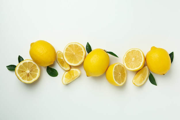 Ripe lemons on white