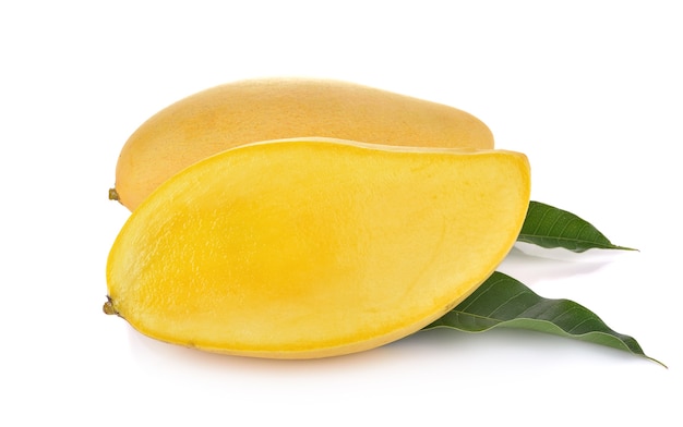 Ripe mango with green leaf on white background