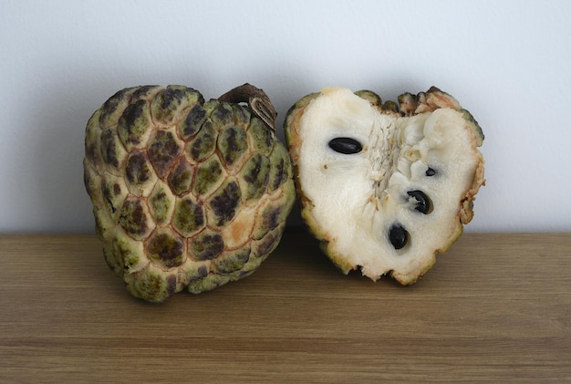 Ripe noina fruit or Custard apple also known as sugar apple on a table