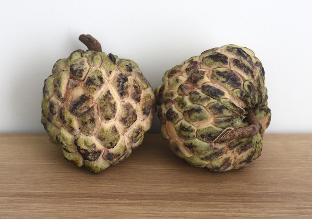 Ripe noina fruit or Custard apple also known as sugar apple on a table