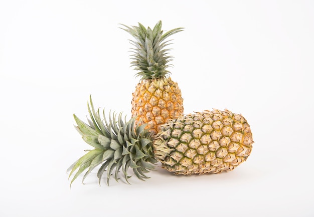 Ripe pineapple on white background