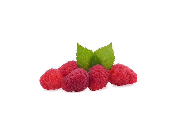 Ripe raspberries with green leaf isolated on white surface