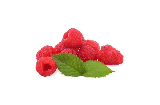 Ripe raspberries with green leaf isolated on white