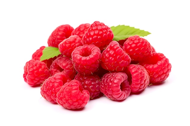 Ripe raspberries with green leaves on a white background closeup