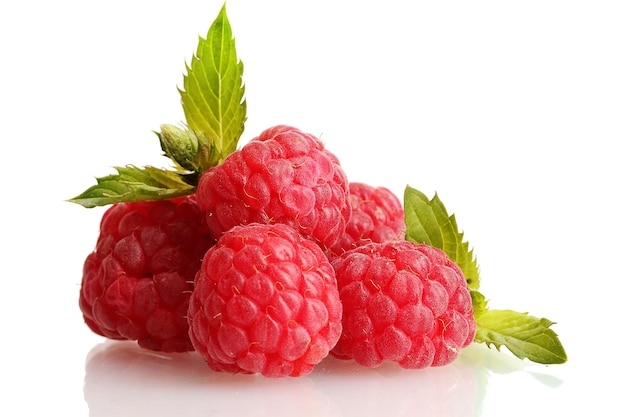 Ripe raspberries with mint isolated on white