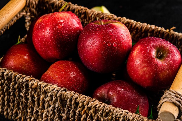 Ripe red apples in a basket