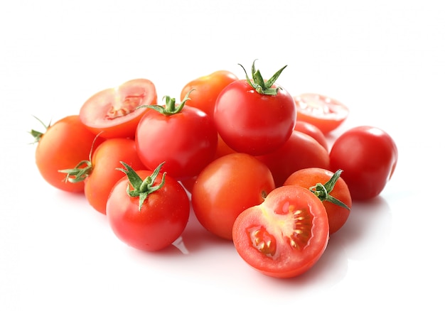 Ripe red cherry tomatoes isolated on white background