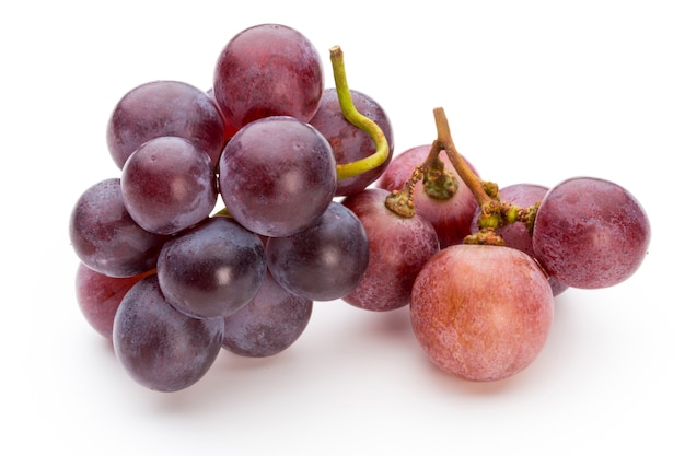 Ripe red grape isolated on white.