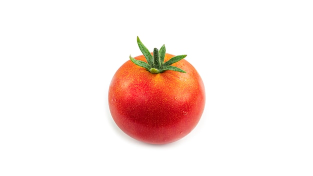 A ripe, red tomato with a green tail.