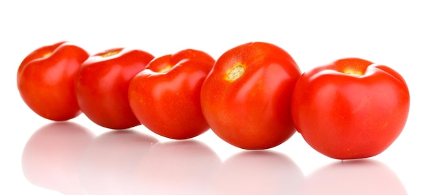 Ripe red tomatoes isolated on white