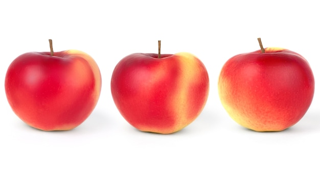 Ripe red-yellow apples on a white isolated.