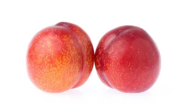 ripe ruby plum fruit isolated on white background