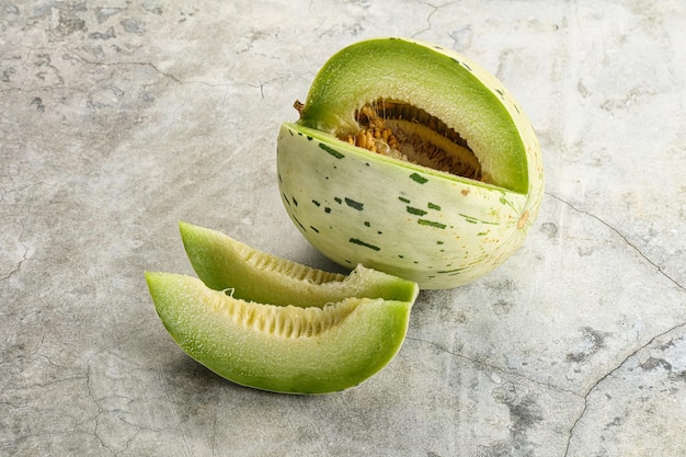 Ripe sweet and juicy dalmatian melon with slices