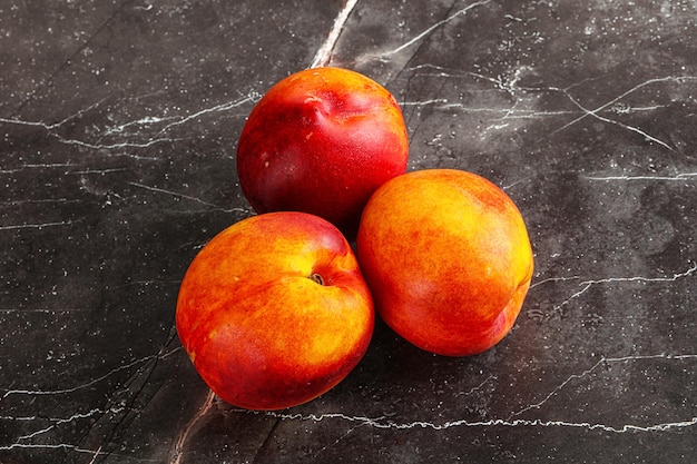 Photo ripe sweet juicy fresh red nectarines