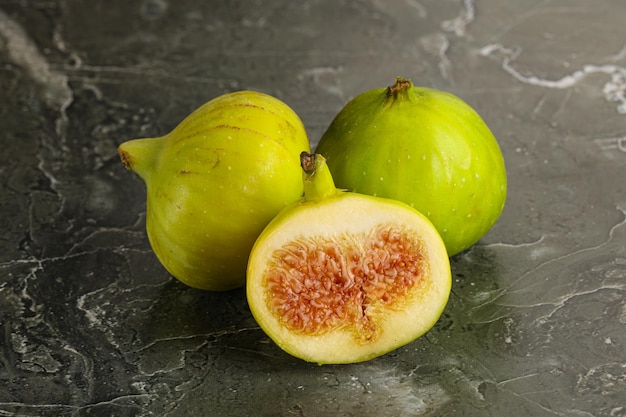 Ripe sweet juicy green fig fruit heap