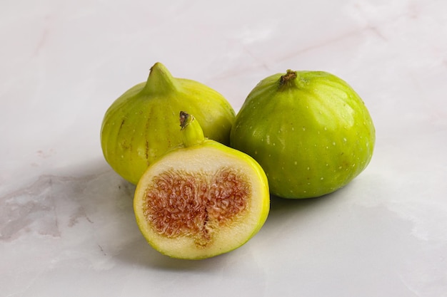 Ripe sweet juicy green fig fruit heap