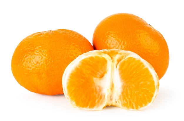 Ripe tangerines and peeled isolated