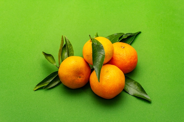 Ripe tangerines with leaves. Fresh fruits