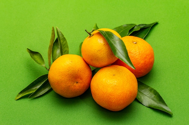 Ripe tangerines with leaves. Fresh fruits