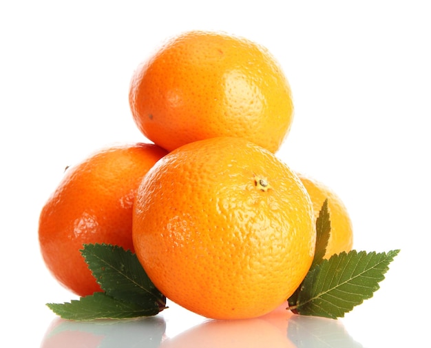 Ripe tangerines with leaves isolated on white