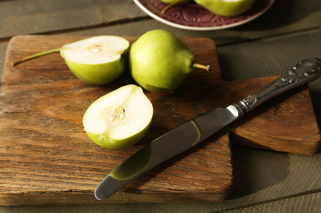 Ripe tasty pears on table close up