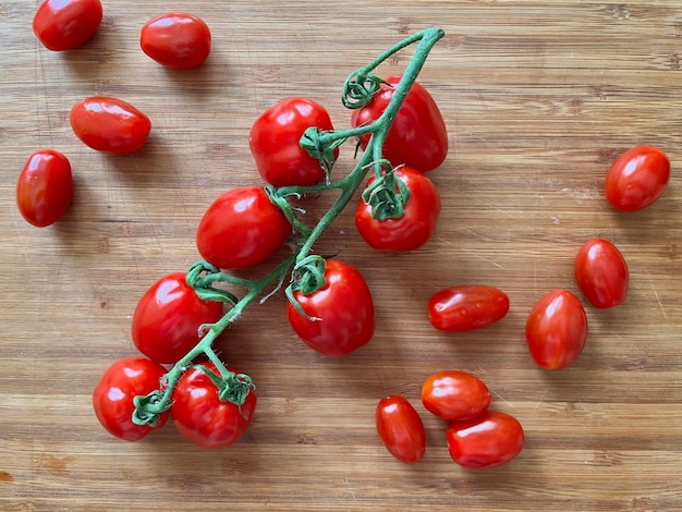 Ripe tomato on cutting board