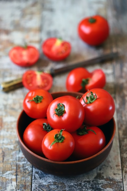 Ripe tomatoes in a bowl Harvest tomatoes