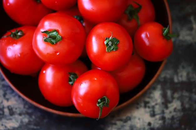 Ripe tomatoes in a bowl