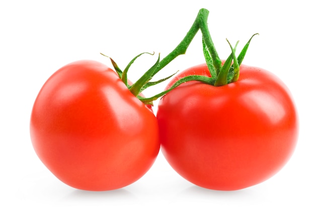 ripe tomatoes close-up on a white 