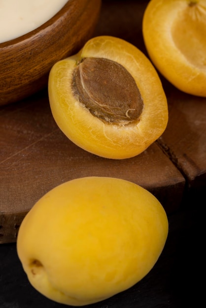 ripe yellow apricots on the table closeup a group of ripe apricots used in cooking