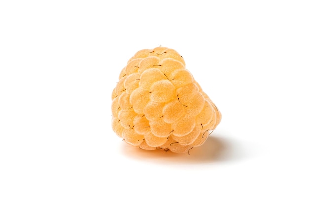 Ripe yellow raspberry isolated on white background