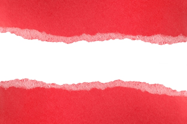 Ripped pieces of red paper isolated on white space. Paper piece torn edge.