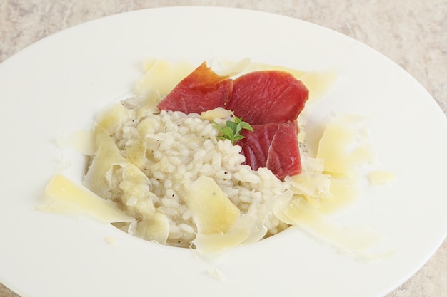 Risotto with duck breast and parmesan