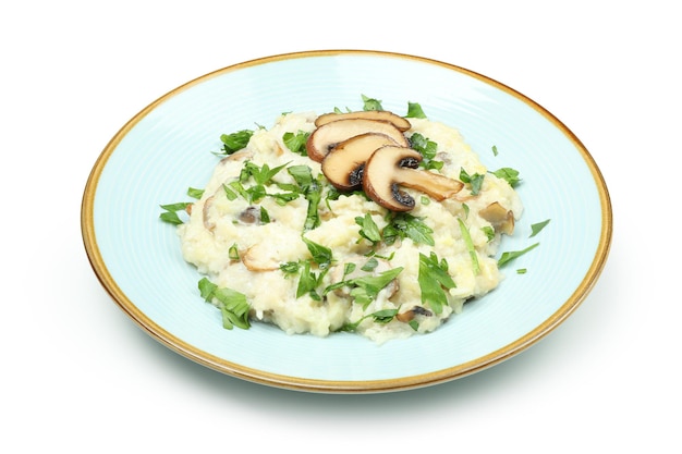 Risotto with mushrooms isolated on white background