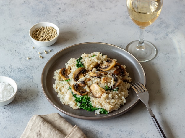 Risotto with mushrooms and spinach