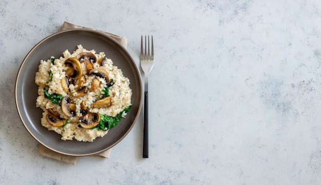 Risotto with mushrooms and spinach