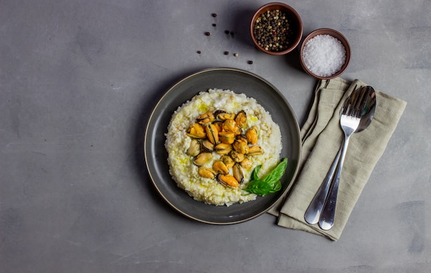 Risotto with mussels . Italian cuisine. Proper nutrition. Vegetarian food.