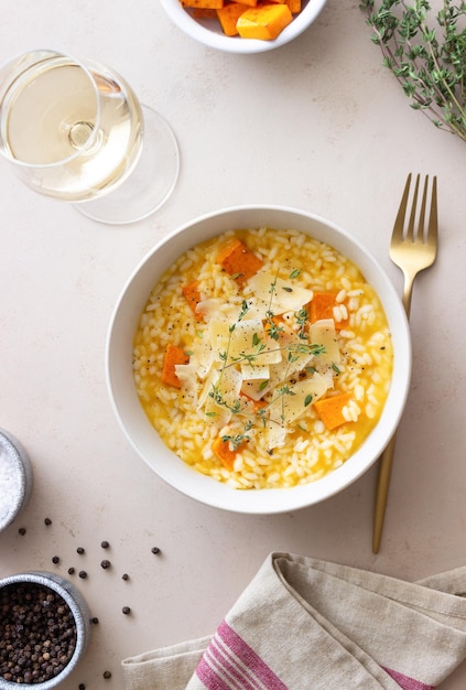 Risotto with pumpkin, cheese and thyme. Vegetarian food. Healthy eating.