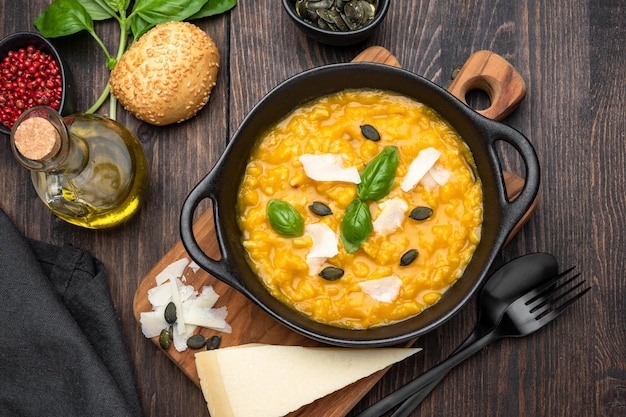 Risotto with pumpkin and pumpkin seeds, parmesan cheese and basil.