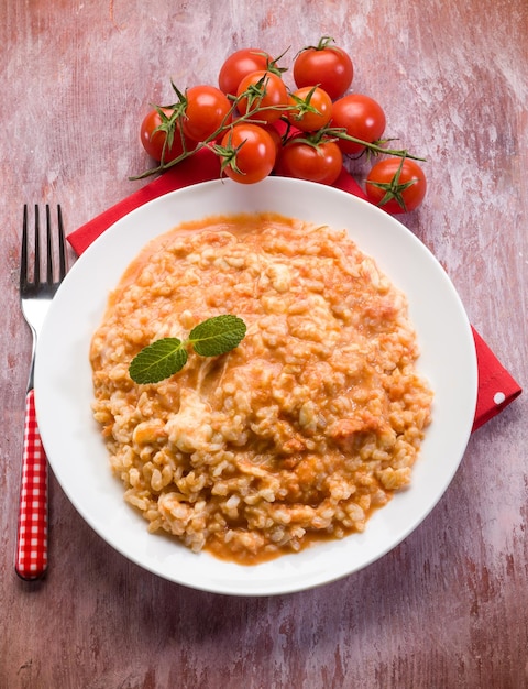 Risotto with tomatoes sauce and mozzarella