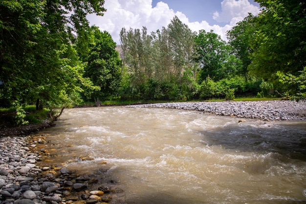 The river flows through the valleys