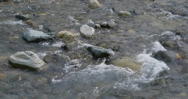 River stream over the pebble stone