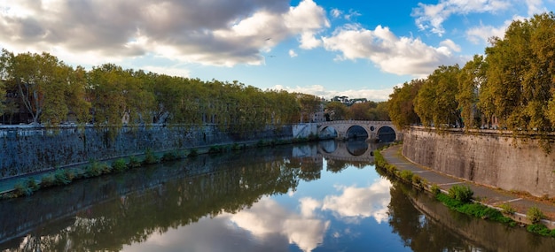 River Tiber and Bridge in a historic City Rome Italy