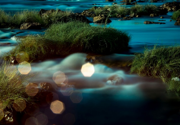 River water in shades of blue with blurred effect long exposure