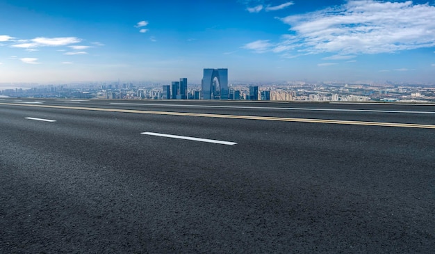 Road and Chinese modern city buildings background