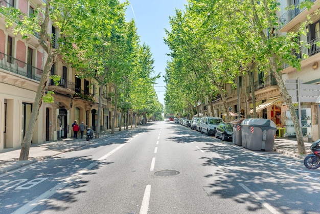 Road on the city street. Cityscape with urban traffic in Barcelona, Spain