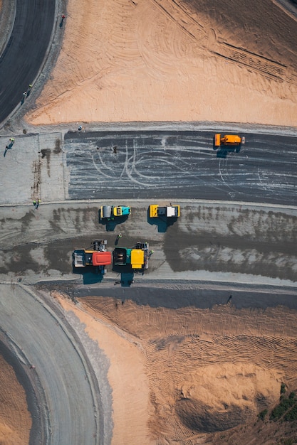 Road construction with road transport equipment top view