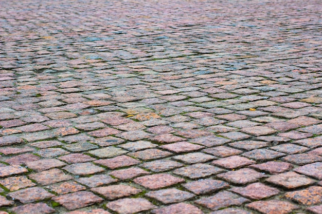 Road cover of granite. Construction space. Close up