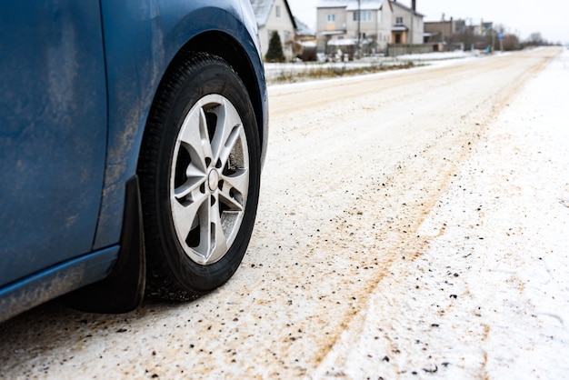 The road is cleared of snow and sprinkled with salt and sand for safe movement