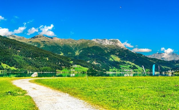 Road at Lake Reschen in South Tyrol, the Italian Alps